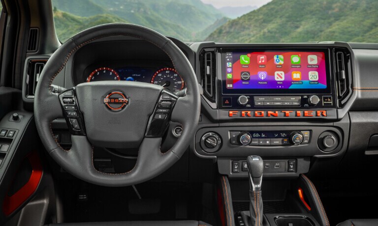 2025 Nissan Frontier infotainment system and wheel
