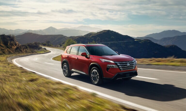 2026 Nissan Rogue driving in the hills