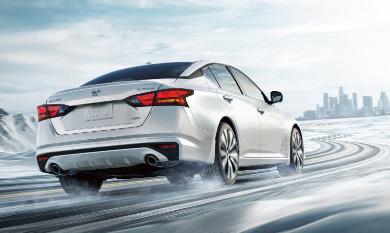 2025 Nissan Altima driving in the snow