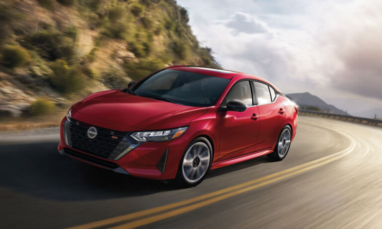 2025 Nissan Sentra driving on mountain curve