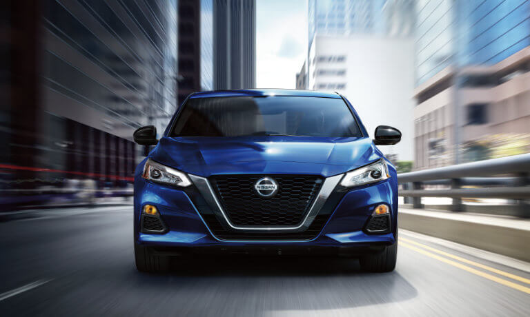 2025 Nissan Altima driving head on in city