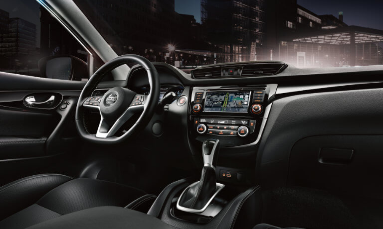 2021 Nissan Rogue Sport interior front at night