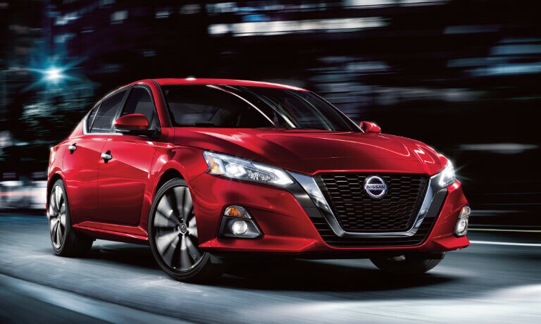 2023 Nissan Altima driving fast at night