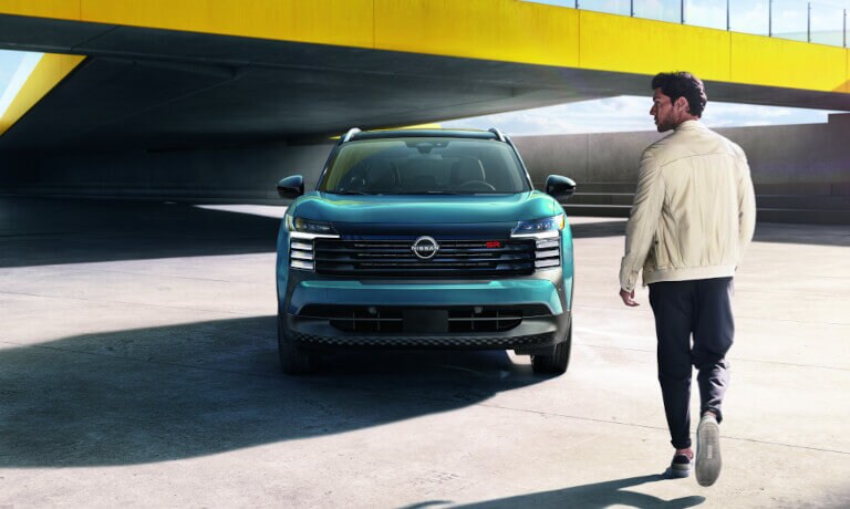 2025 Nissan Kicks head on with approaching driver