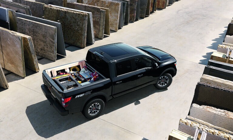 2023 Nissan TITAN overhead view with equipment in bed