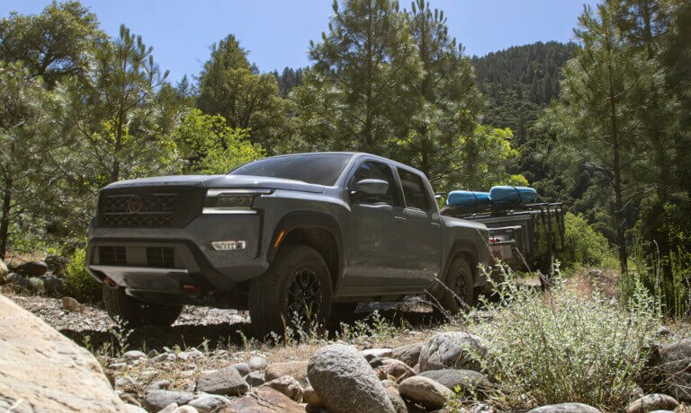 2023 Nissan Frontier towing kayaks on a trailer