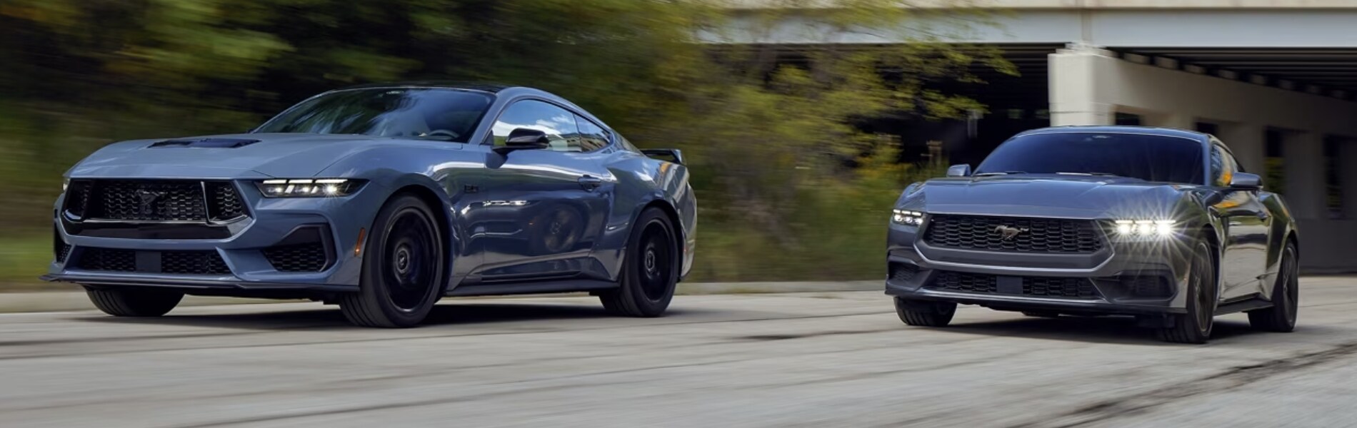 2024 Ford Mustang drive next to each other.png 2024 Ford Mustang drive next to each other