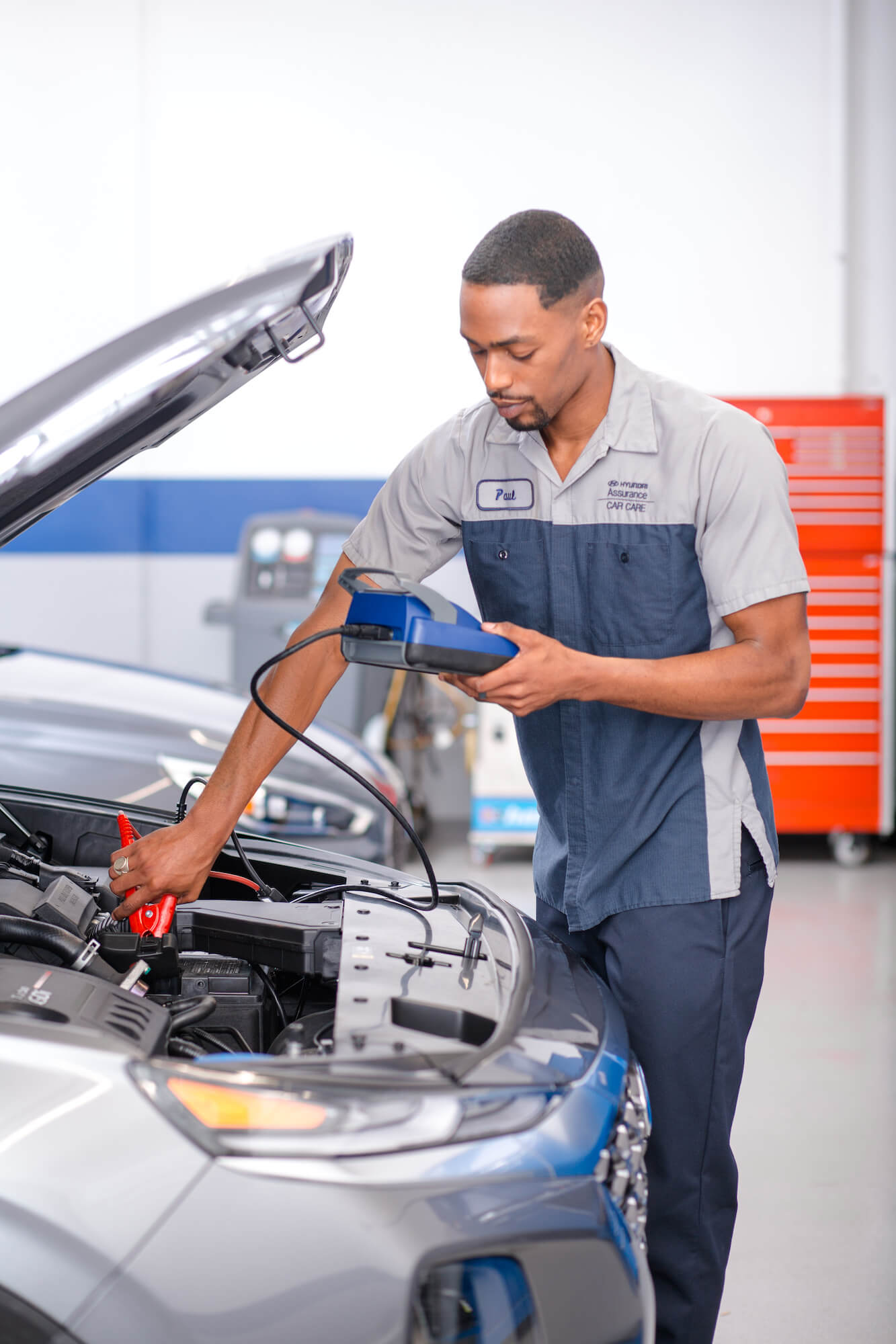Hyundai of Central Florida - Service Technician Testing Battery Charge
