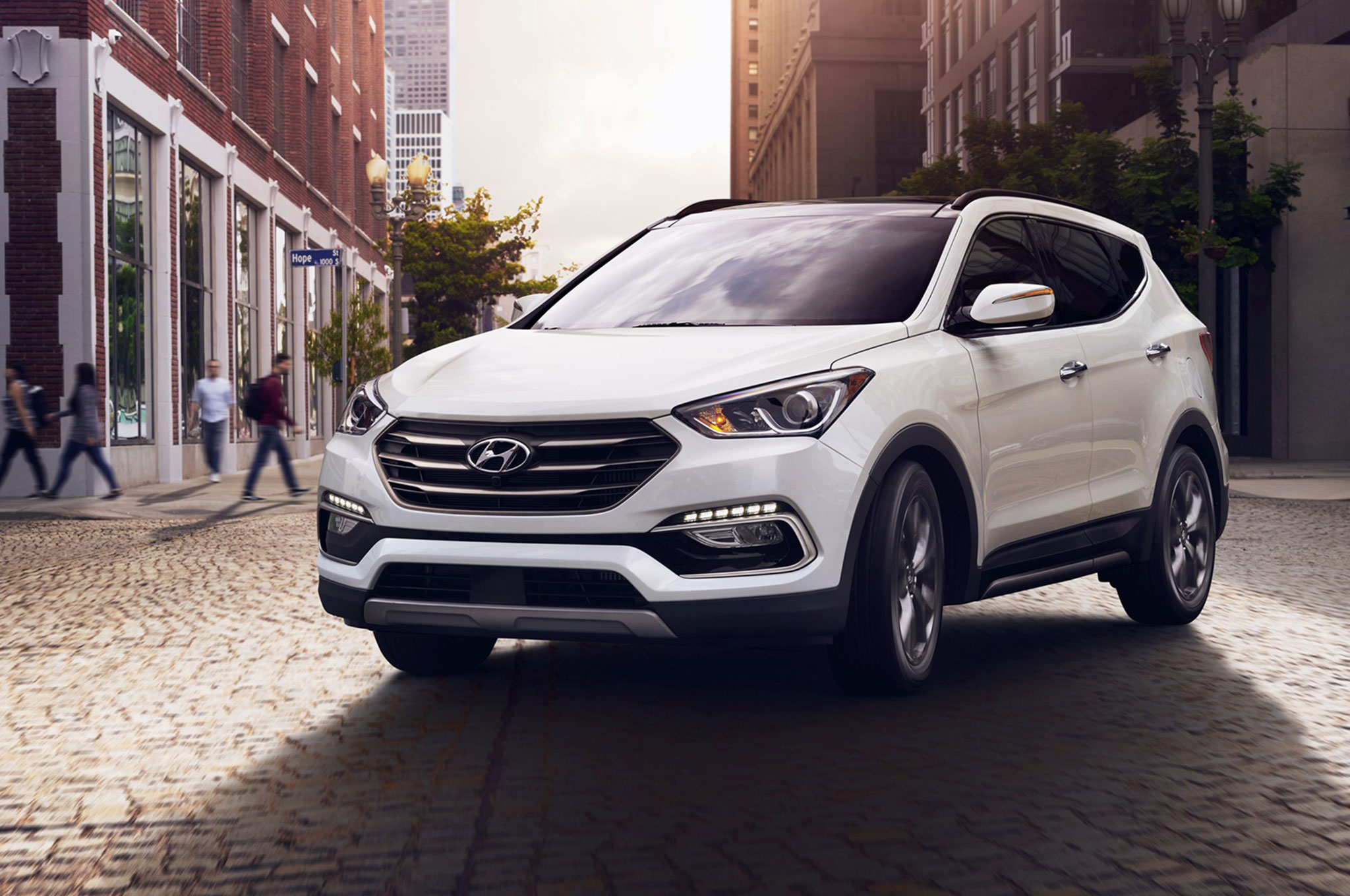 2017-Hyundai-Santa-Fe-Sport-front-three-quarter-in-motion-03.jpg