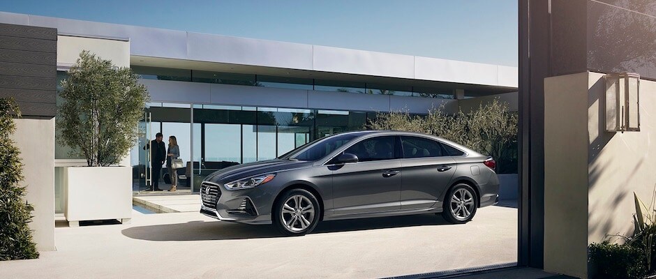 2018_Sonata_Limited_Ultimate_Gray_0025_Driveway.jpg A Hyundai Sonata in a driveway