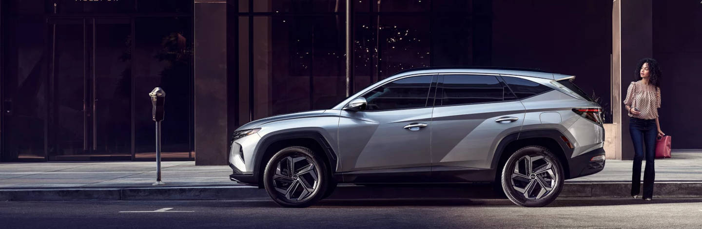 Hyundai Tucson parked next to a meter