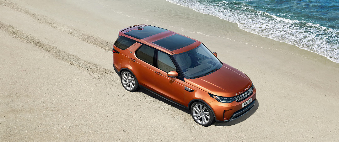 2018 land rover discovery on beach
