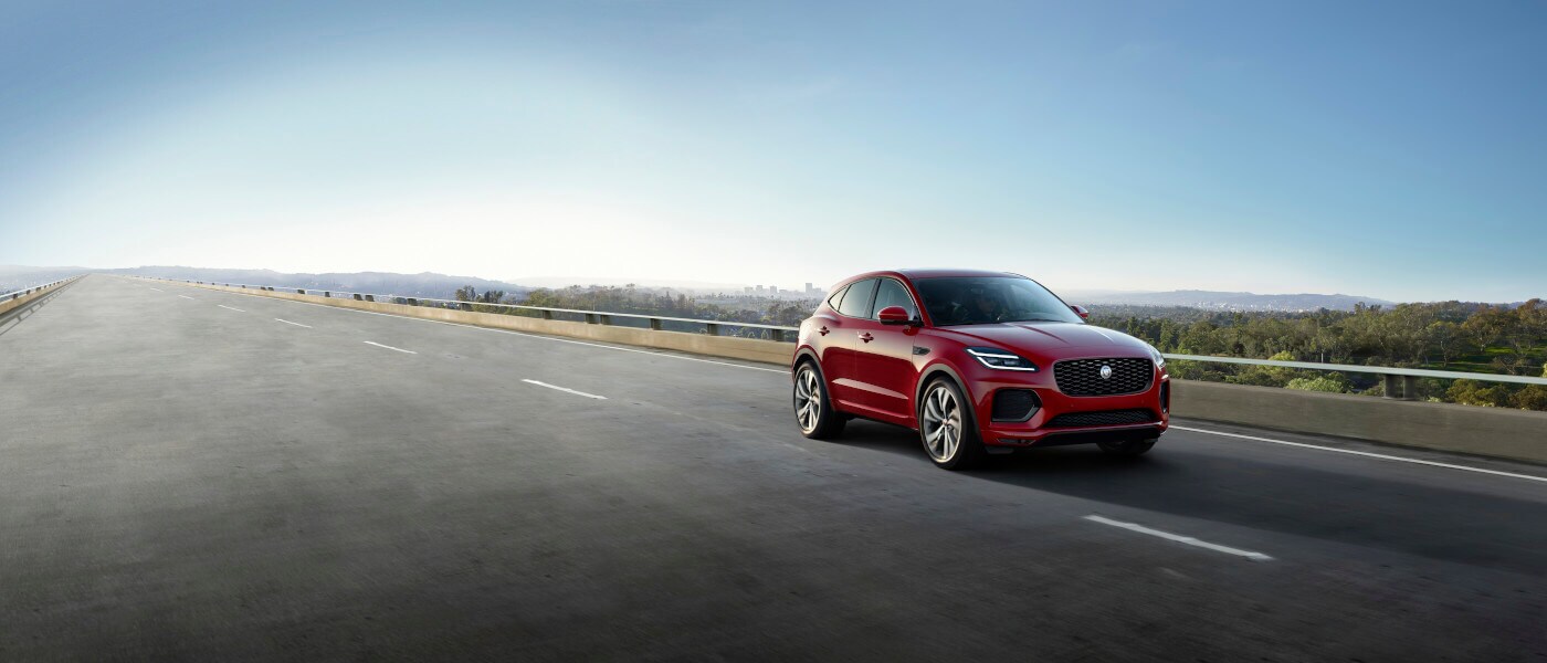 2022 Jaguar E-PACE driving on a bridge