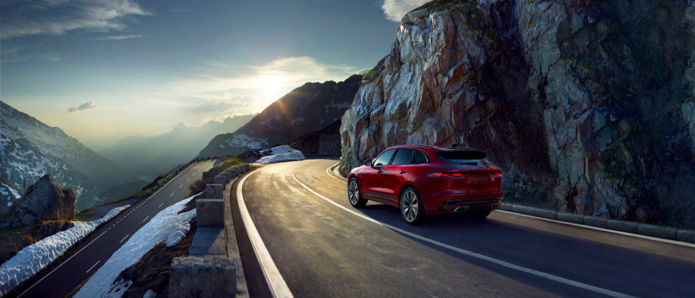 2021 Jaguar F-PACE driving exterior rearview