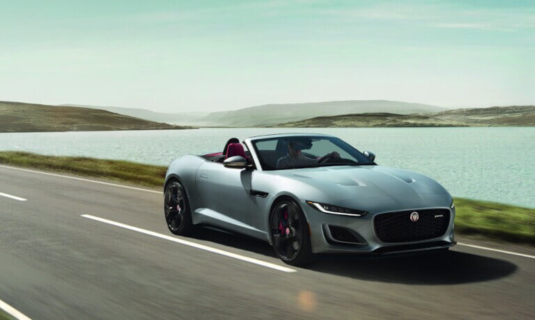 2023 Jaguar F-TYPE convertible driving waterside