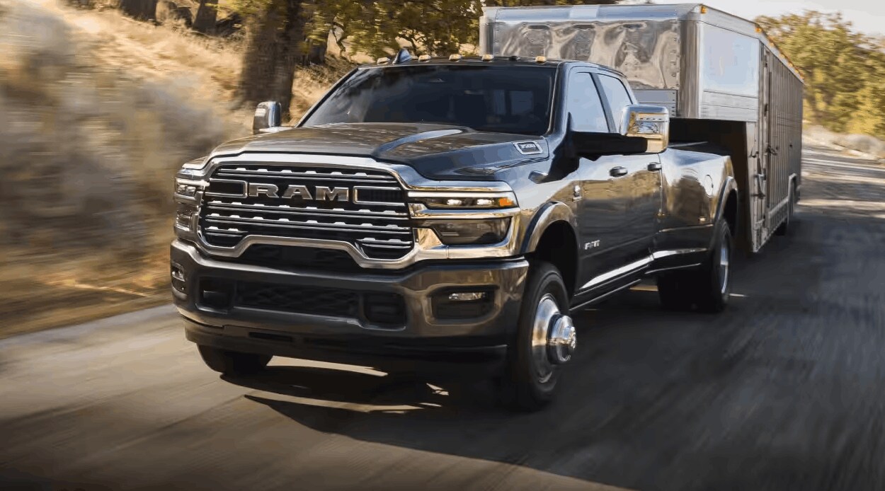 2026 RAM 3500 Heavy Duty towing an enclosed trailer