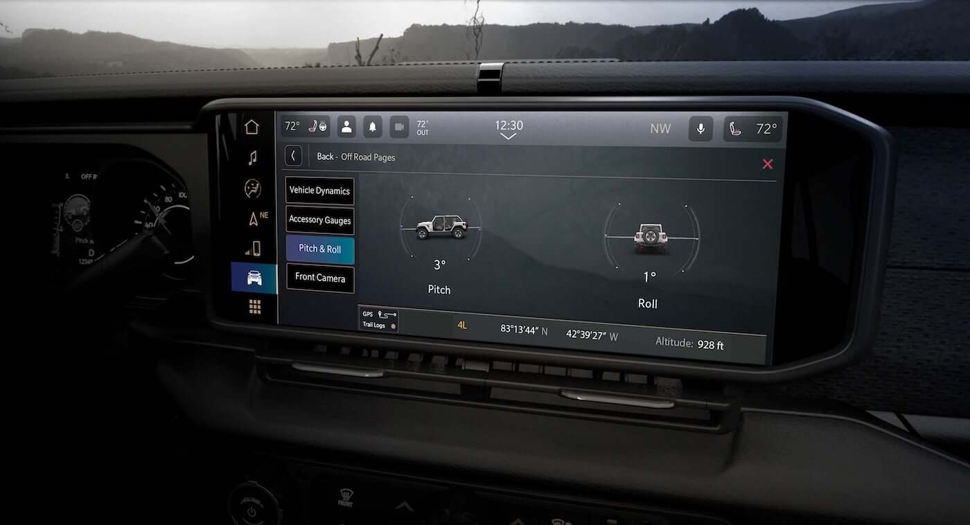 Jeep Off-Road Pages showing real-time pitch and roll measurements on the Uconnect display