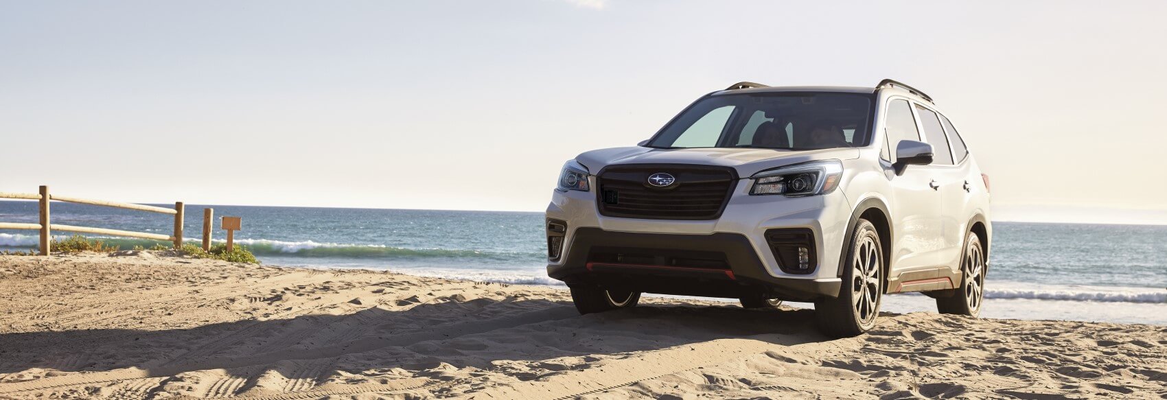 Subaru Forester parked on a beach