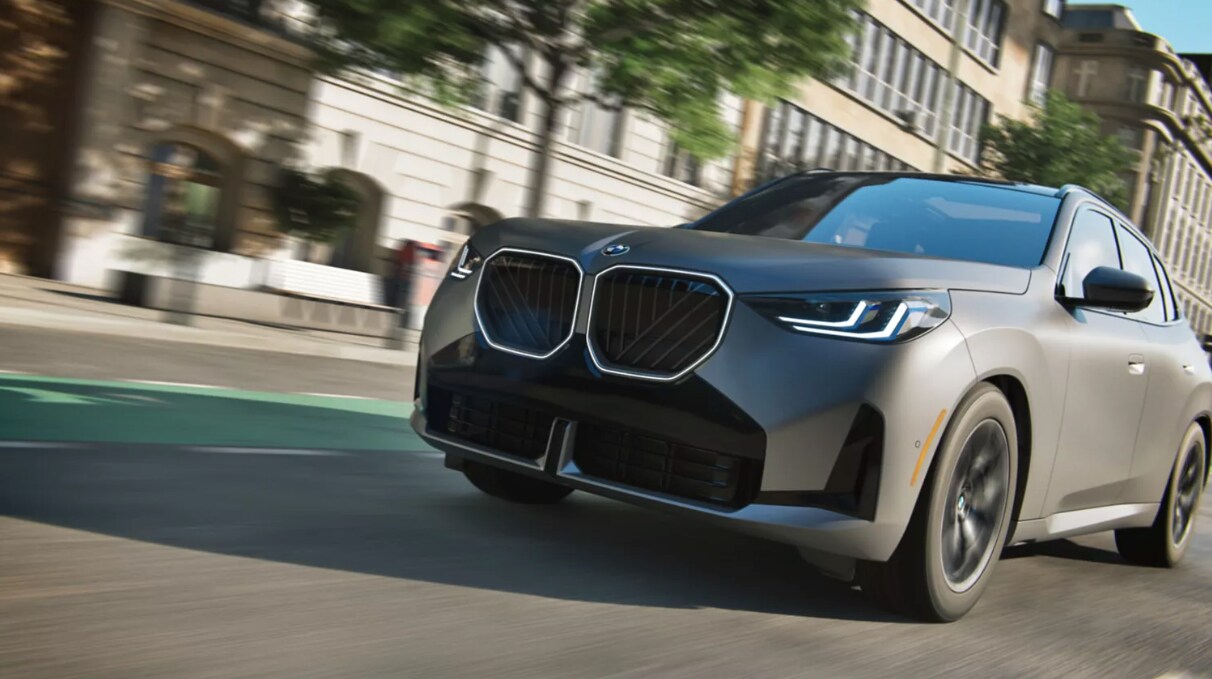 Front view of the 2025 BMW X3 in a downtown setting Front view of the 2025 BMW X3 in a downtown setting