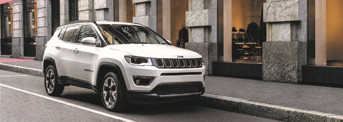 white 2019 jeep compass passenger front side