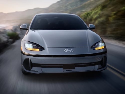Close up front view of 2025 Hyundai IONIQ 6 driving fast on the
highway