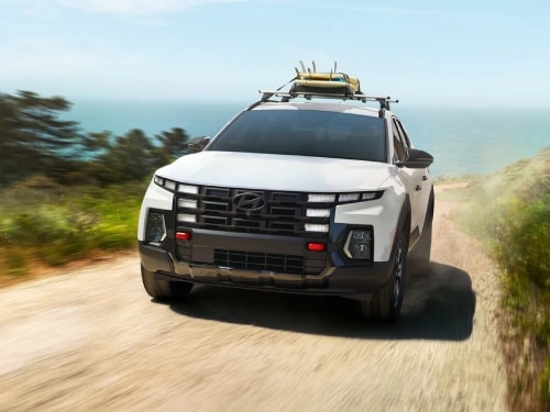 2025 Hyundai Santa Cruz offroading on a dirt path