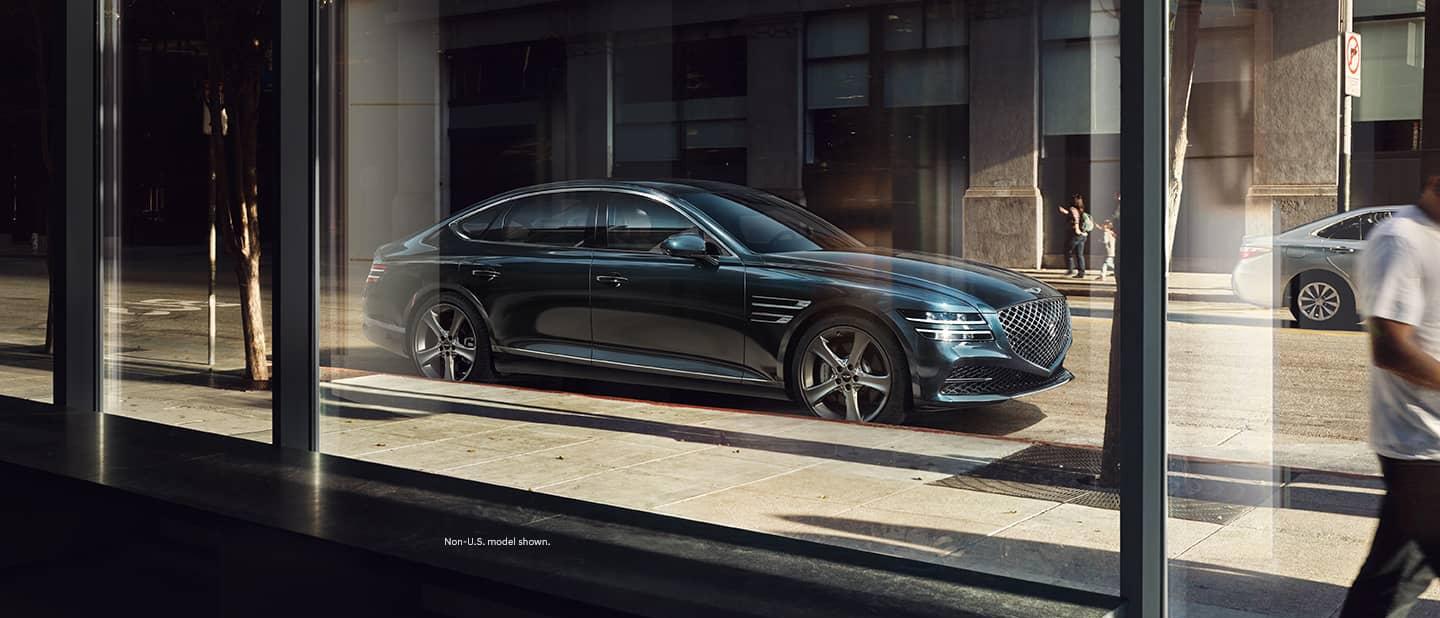 Genesis of York is a Jack Giambalvo Car Dealership in Hallam, PA | View of 2021 Genesis G80 through window