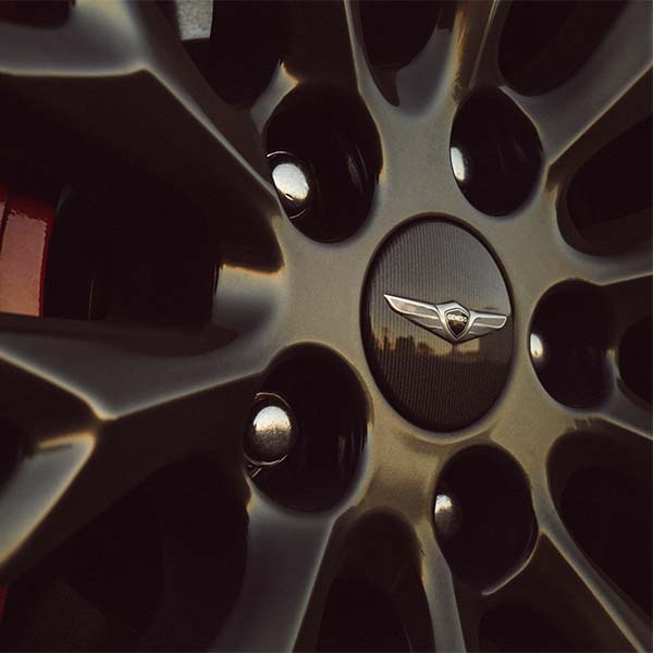 Model Features of the 2022 Genesis G70 at Genesis of York | Badging on the Tire of the 2022 Genesis G70