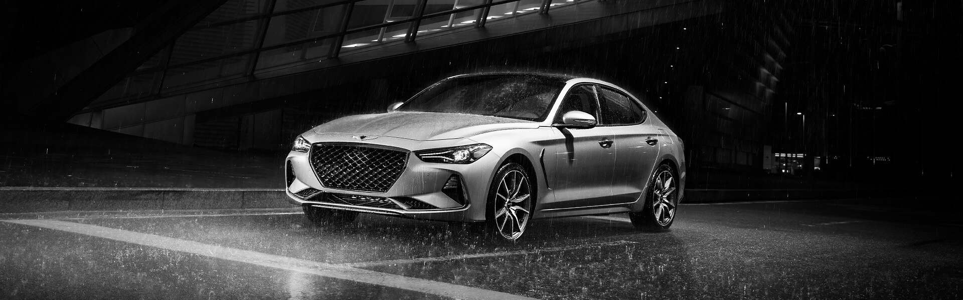 Genesis of York is a Jack Giambalvo Car Dealership in Red Lion, PA | 2020 Genesis G70 driving at night