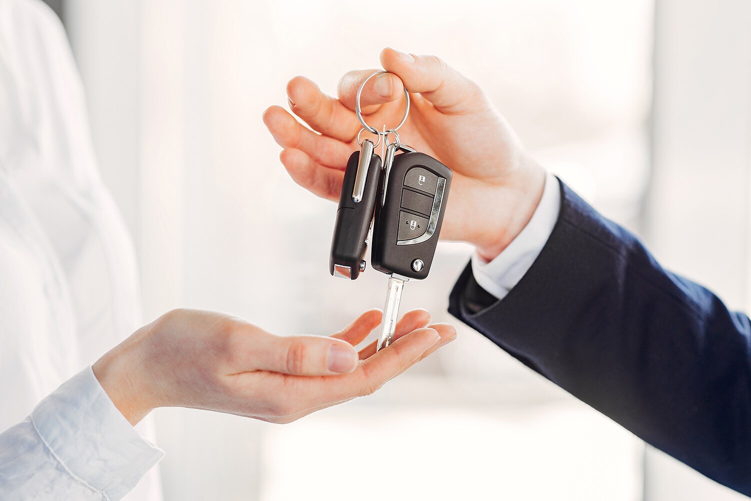 Can I trade in my leased vehicle at Genesis of York | Customer trading in lease and handing over keys