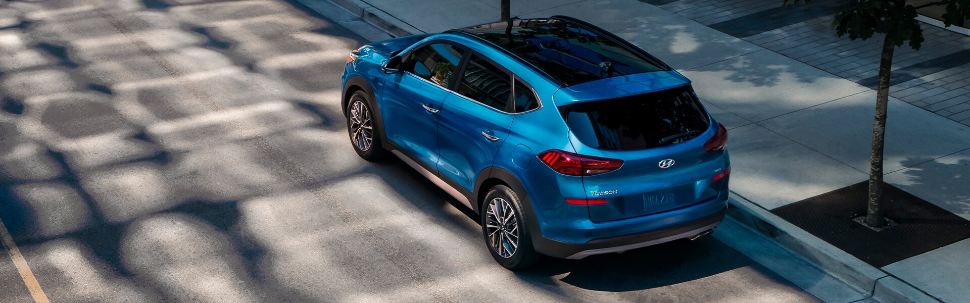 Jack Giambalvo Hyundai is a Hyundai Dealership in York near York, PA | Blue 2020 Tucson Street Parked in the City Jack Giambalvo Hyundai is a Hyundai Dealership in York near York, PA | Blue 2020 Tucson Street Parked in the City