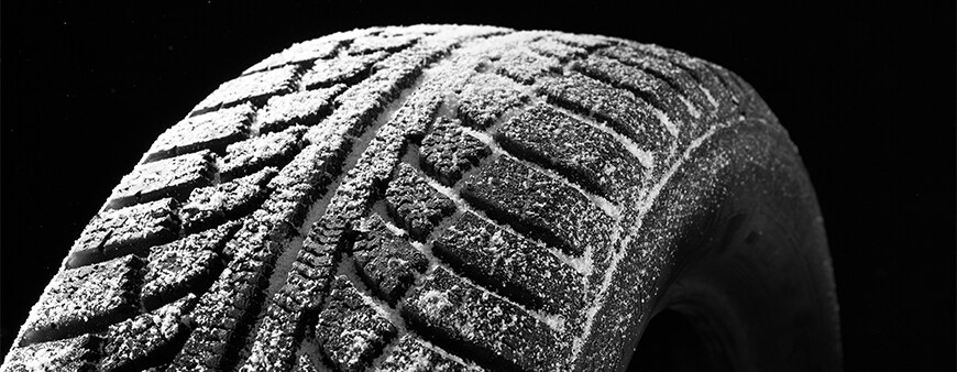 How to prepare your Hyundai for the winter season in York, PA at Jack Giambalvo Hyundai | Close up of tire covered with snow on a black background