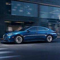 The 2021 Hyundai Elantra vs. The 2021 Hyundai Sonata at Jack Giambalvo Hyundai | Sonata drives past