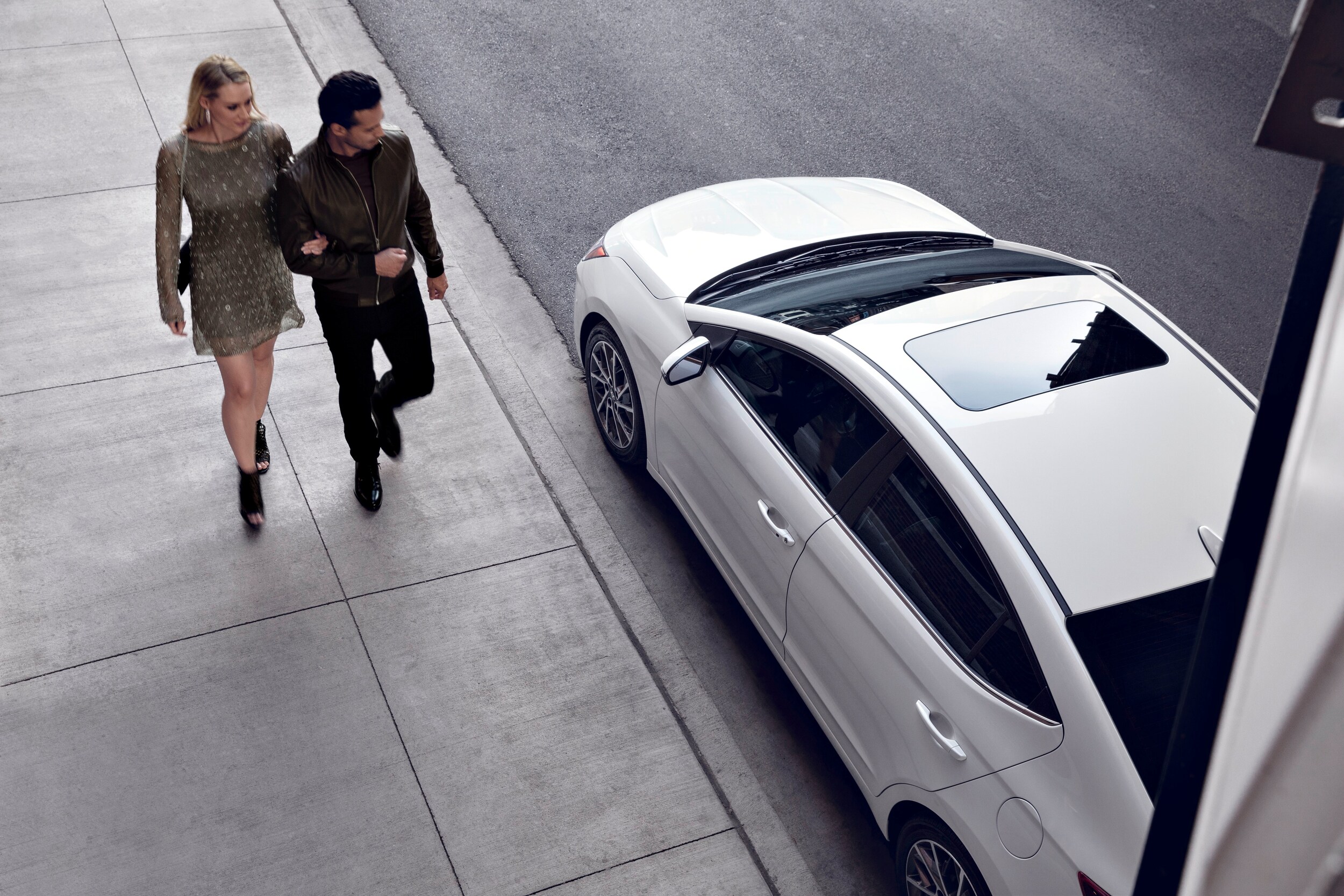 Jack Giambalvo Hyundai is a Hyundai Dealership in York near Manchester, PA | Couple walking toward 2020 Hyundai Elantra parked on street