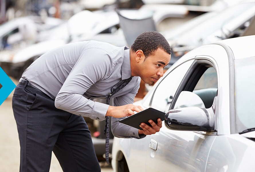 Jack Giambalvo Hyundai Collision Center | Insurance Adjuster Doing Final Inspection of Vehicle