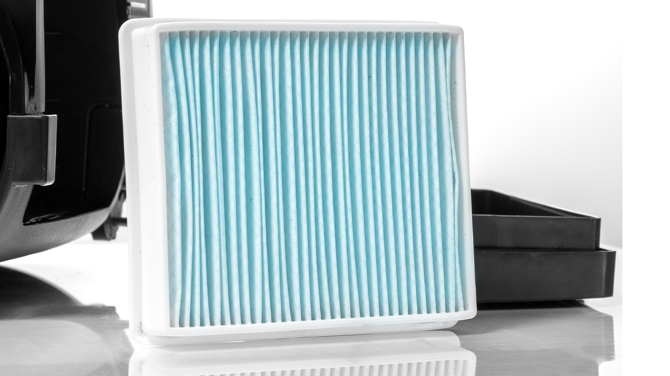 Cabin air filter replacement at Jack Giambalvo Hyundai | New cabin air filter in the color blue
