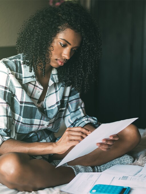Jack Giambalvo Hyundai is a Hyundai Dealership in York near York, PA | Young Girl Sitting on Bed Going Over Finances Jack Giambalvo Hyundai is a Hyundai Dealership in York near York, PA | Young Girl Sitting on Bed Going Over Finances