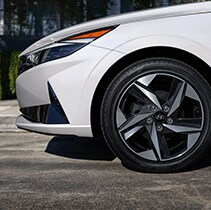 The 2021 Hyundai Elantra vs. The 2021 Hyundai Sonata at Jack Giambalvo Hyundai | Close-up on Elantra's front tire
