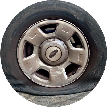 How to check your tires' health at Jack Giambalvo Hyundai | Close-up of a flat truck tire