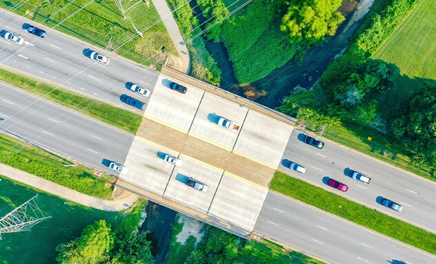 Jack Giambalvo Mazda is a Car Dealership in Dillsburg, PA | An aerial shot of a highway bridge crossing a small creek