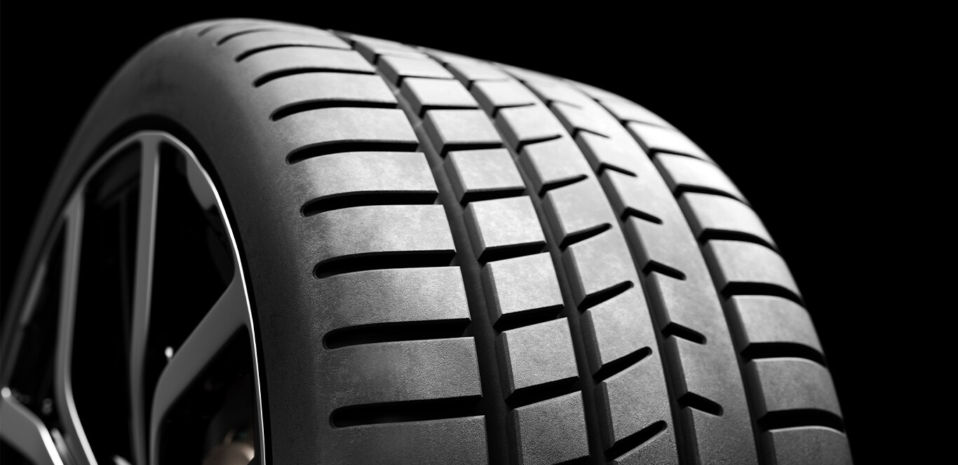 What is Tire and Rim Protection? | Jack Giambalvo Mazda | Detail close up of car tire with black background
