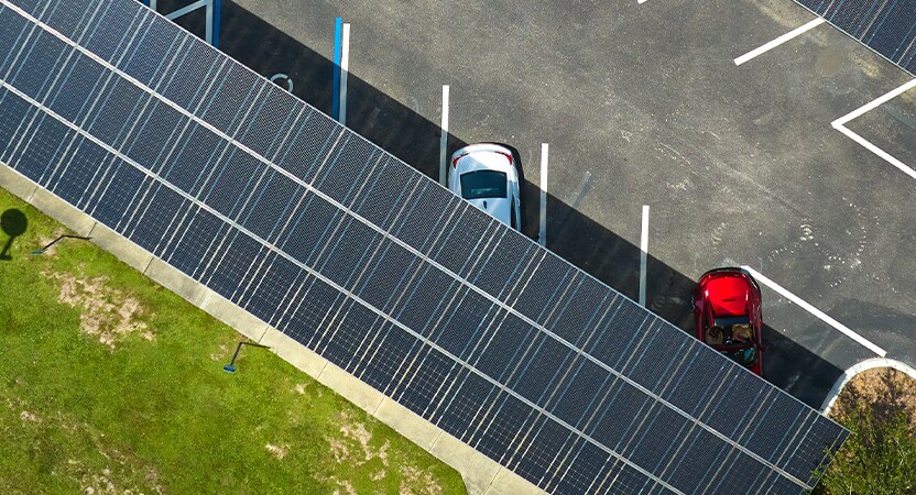 Extend the Life of Your Vehicle at Jack Giambalvo Mazda in York, PA | Cars parked under the shade of solar panel parking lot