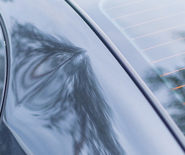 What is Paintless Dent Repair? | Jack Giambalvo Mazda | Dent Next to Back Windshield On Vehicle
