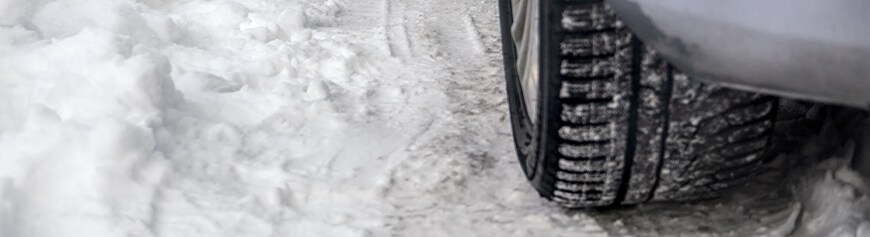 How to prepare your Mazda for the winter season in York, PA at Jack Giambalvo Mazda | Car tires stopped on top of snow road