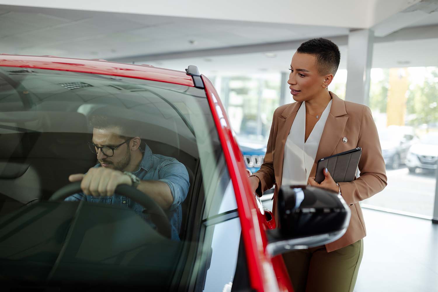 Things to Check When Buying a Used Car | Jack Giambalvo Mazda in York, PA | Customer sitting in vehicle before buying to see if he likes it