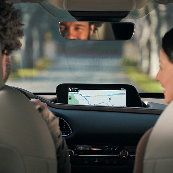 The 2022 Mazda CX-5 vs. The 2022 Mazda CX-30 at Jack Giambalvo Mazda | Infotainment System in the 2022 Mazda CX-30 Displaying Navigation System