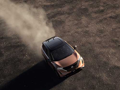 2023 Nissan ARIYA driving in the dirt
