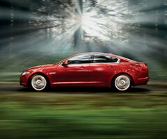 XF Exterior of a certified pre-owned car from Crown Jaguar in motion.
