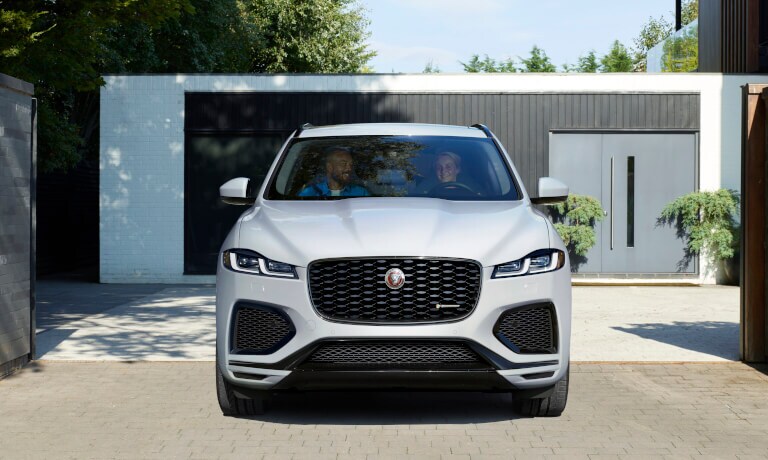 2023 Jaguar F-PACE Exterior Head On Driving Through Front Gate