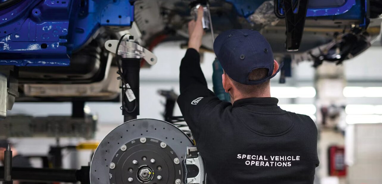 TITLE A Jaguar service technician performing service on a vehicle